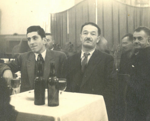 Young Orhan Deval in coffee house with fellow captains - 1942